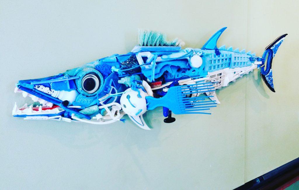 Artwork of a fish made out of plastics collected from marine debris
