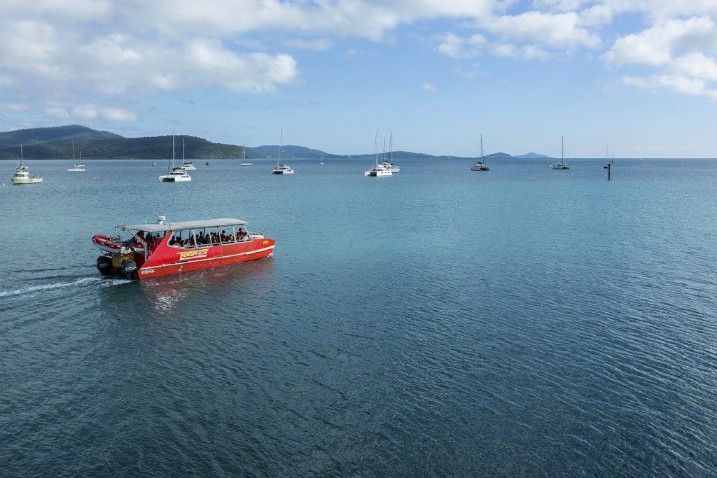 Red Cat Adventures' vessel Thundercat leaving Coral Sea Marina on a day trip to the Whitsunday islands