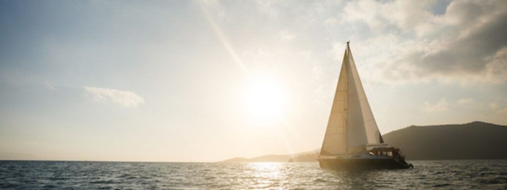 Sailing vessel in the Whitsundays at sunset