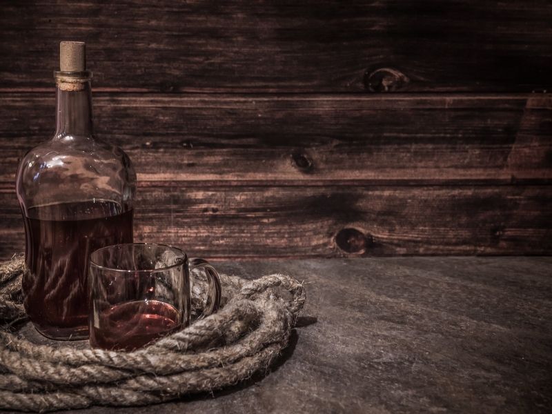 A Rum bottle with marine rope